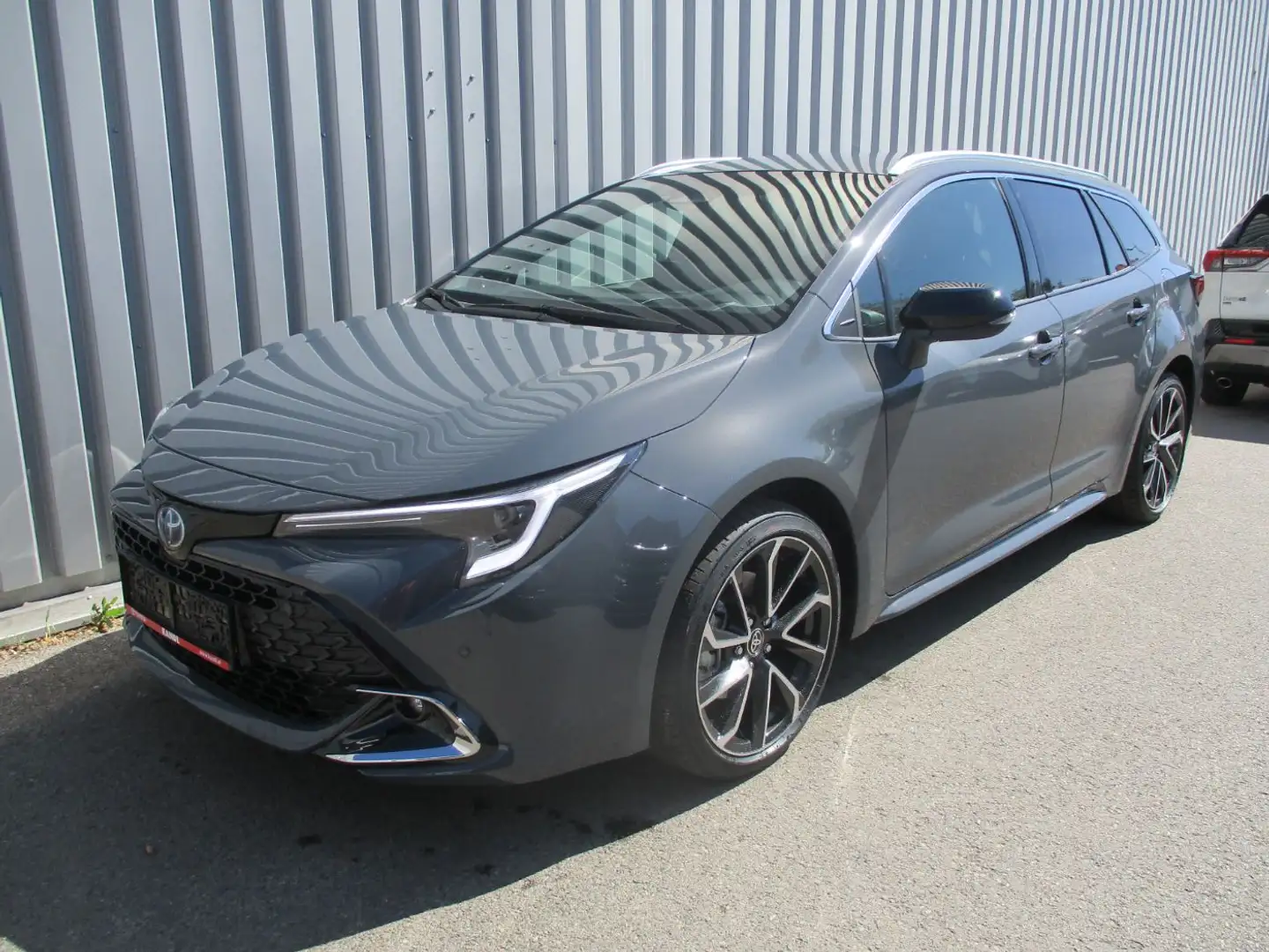 Toyota Corolla TS 2.0 HSD Lounge Grau - 2