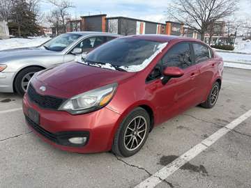 5 speed manual..attractive red gas saver