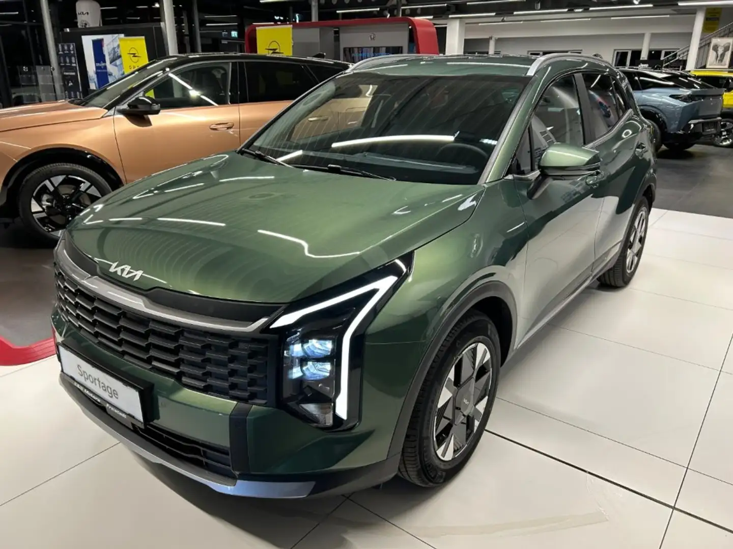 Kia Sportage 1,6 TGDI 7 Gang DCT 4WD Grün - 1