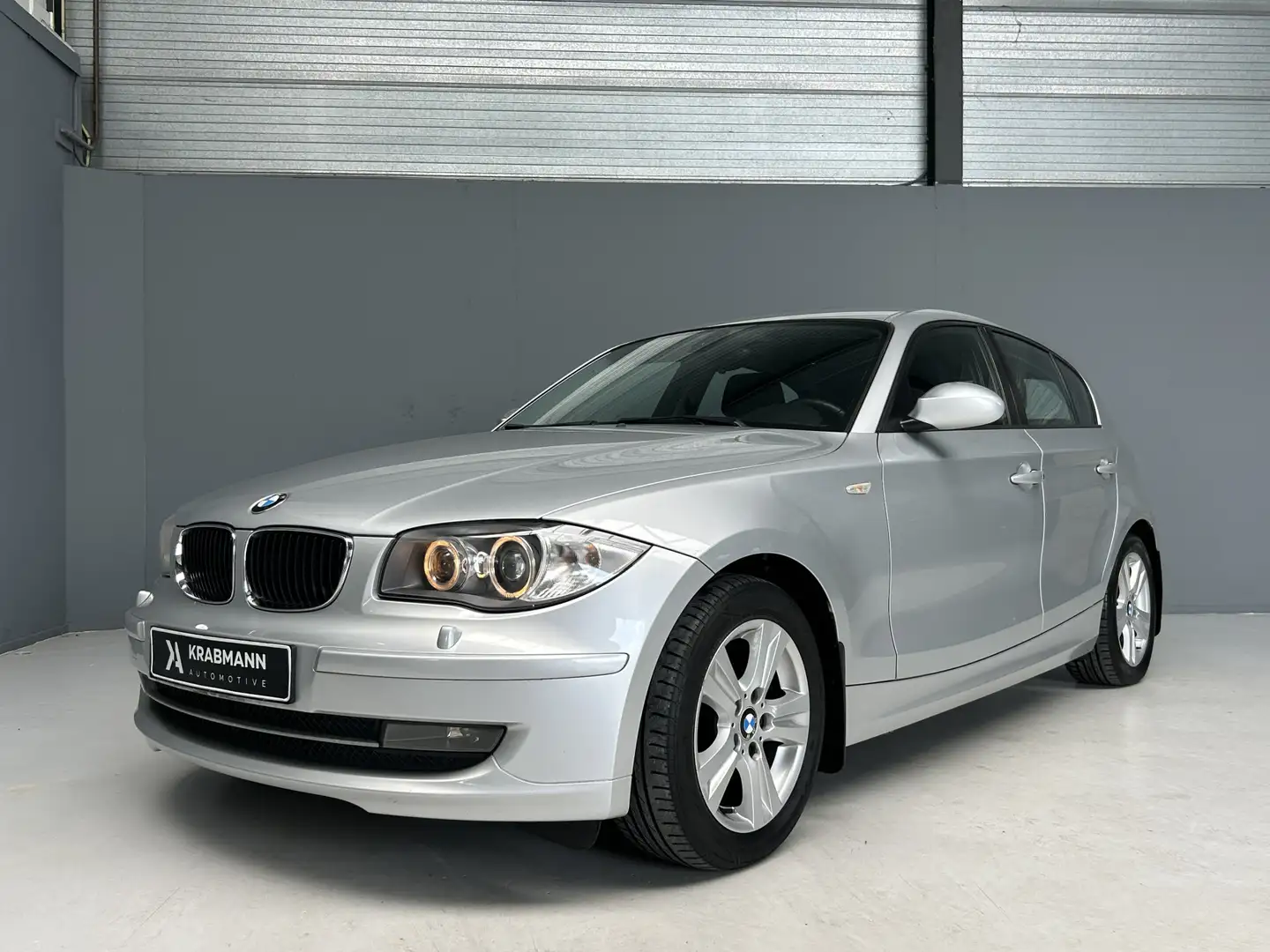 BMW 116 1-serie 116i High Executive Automaat|Cruise|Clima| Zilver - 1