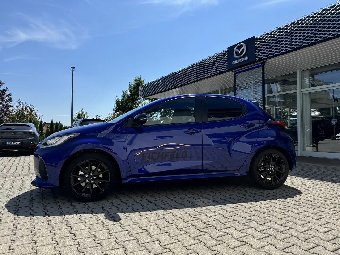 Mazda 2 Hybrid 2024 HOMURA PLUS 1.5L VVT-i 116 PS e-CVT FW Blau - 2