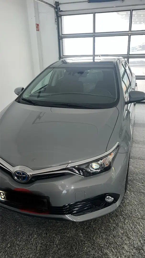 Toyota Auris 1.8 VVT-i Hybrid Automatik mit Mietwagen paket - 1