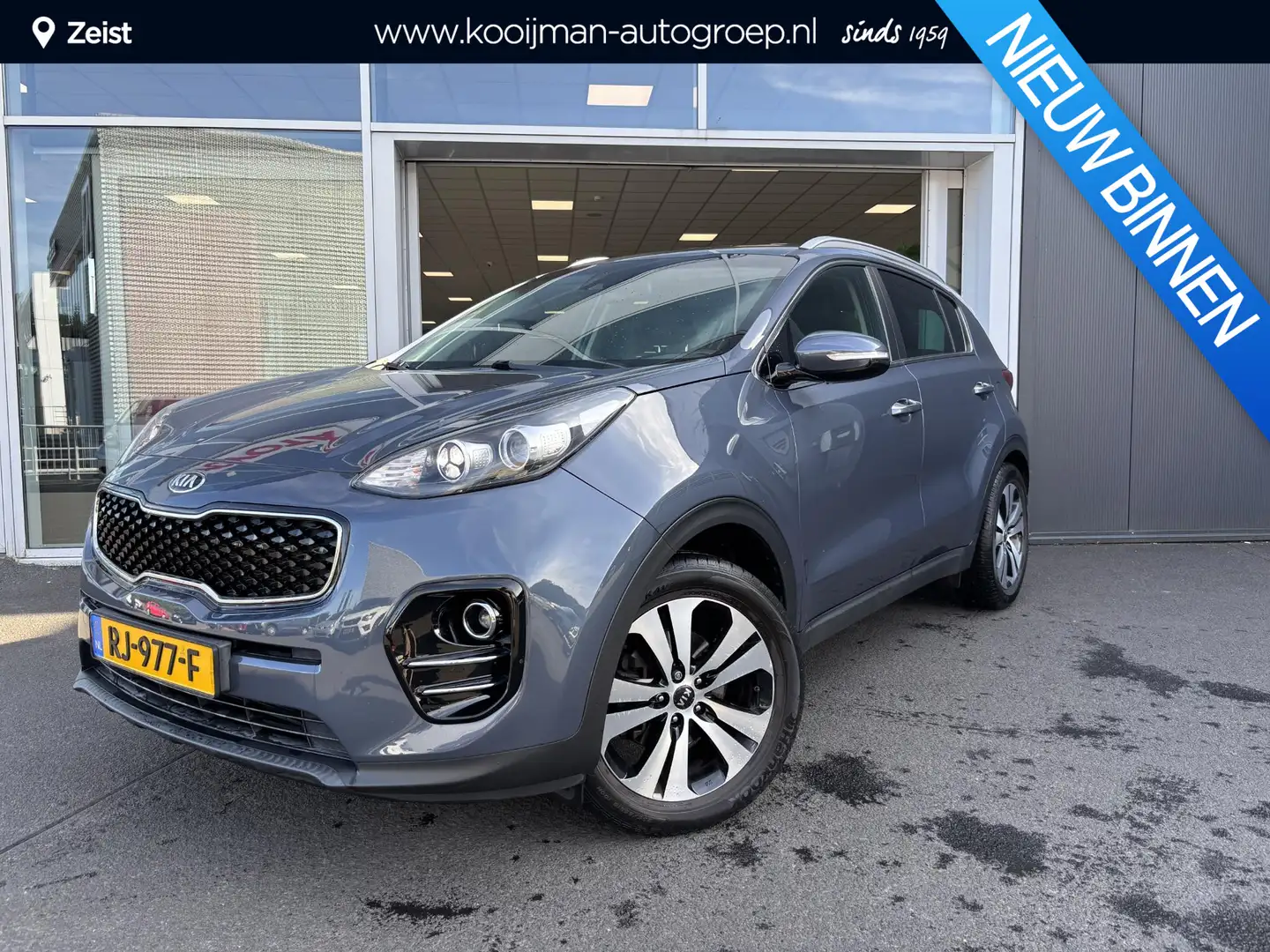 Kia Sportage 1.6 GDI Style Edition Trekhaak | Ledereninterieur Blauw - 1