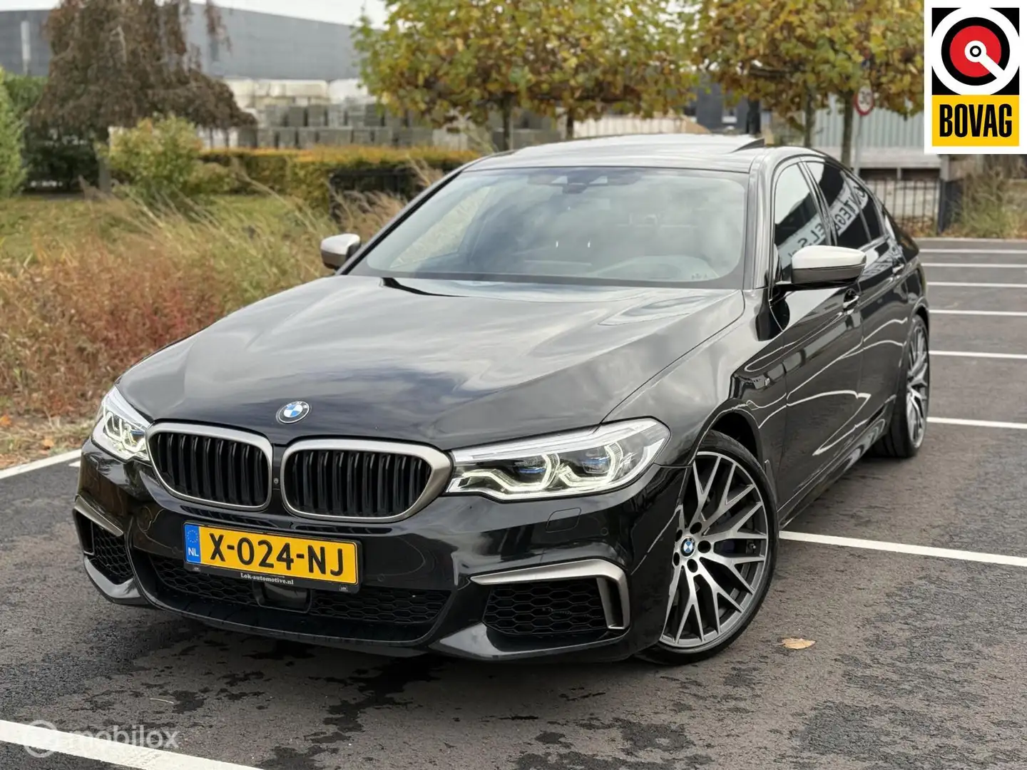 BMW M550 5-serie M550i xDrive High Executive PANO|360|LEDER Zwart - 1