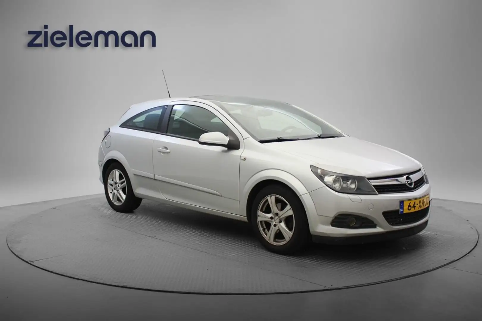 Opel Astra GTC 1.4 Temptation - Panorama, Airco, Cruise, NIEU Grigio - 1