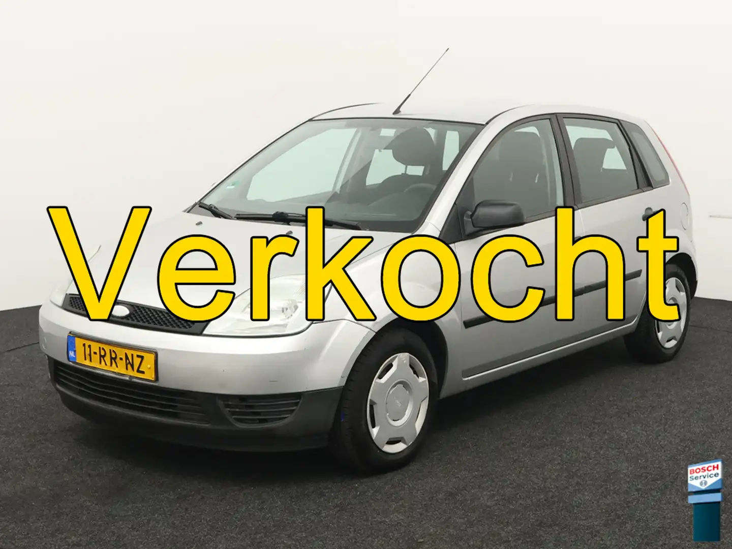 Ford Fiesta 1.3 Futura Trekhaak, airco, Warmtewerend glas, Het Grijs - 1