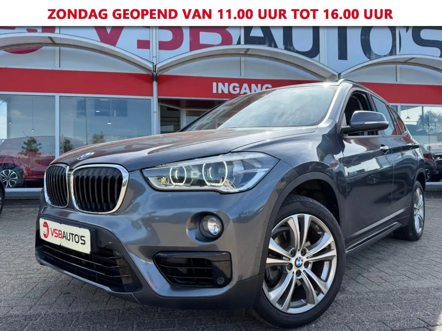 BMW X1 S-DRIVE 1.8 AUT. SPORT-LINE NAVI TREKHAAK AIRCO LM Grijs - 1