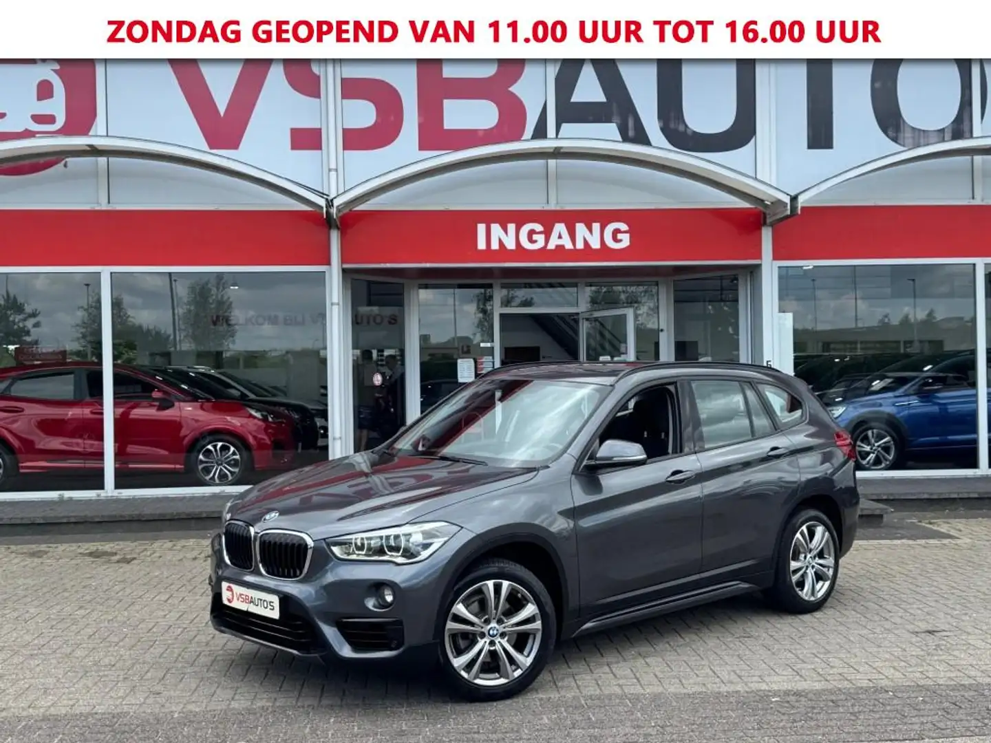 BMW X1 S-DRIVE 1.8 AUT. SPORT-LINE NAVI TREKHAAK AIRCO LM Grijs - 1