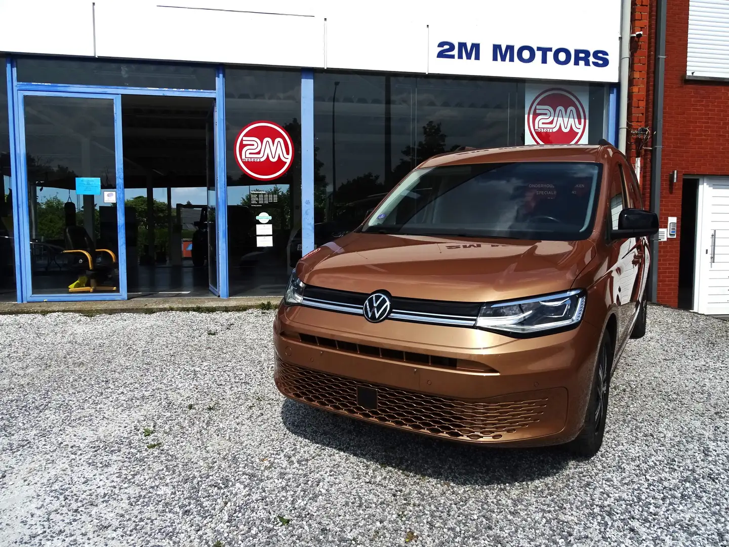 Volkswagen Caddy 1.5 TSI Style 5pl. DSG Bruin - 1