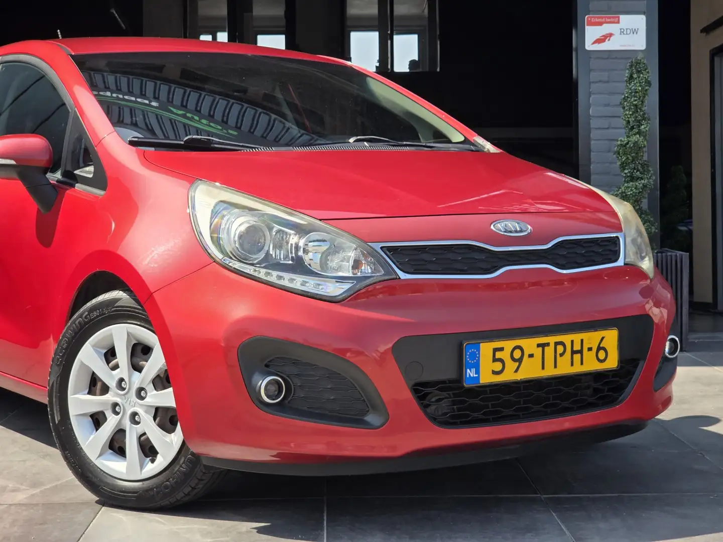 Kia Rio 1.2 CVVT Super Pack|Airco|Trekhaak|KeylessGo|NAP|A Rosso - 2