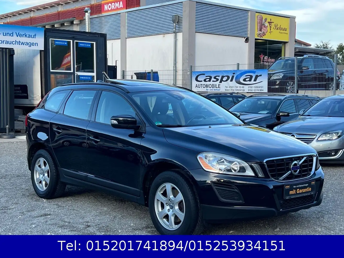 Volvo XC60 Kinetic 2WD,PANORAMA,NAVI,SHZ,PDC,1.HAND Zwart - 1