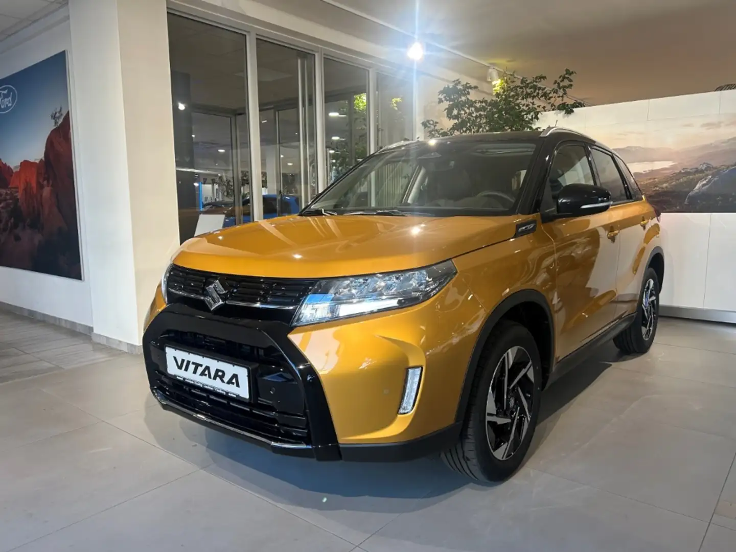 Suzuki Vitara Comfort+ PANO/KEYLESS/ACC Oro - 1