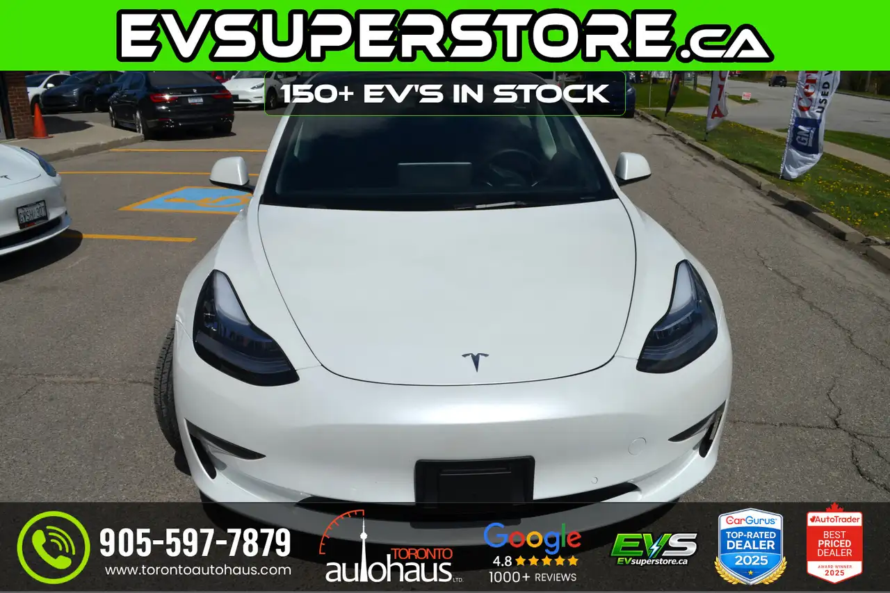 Tesla Model 3 photo Tesla Model 3