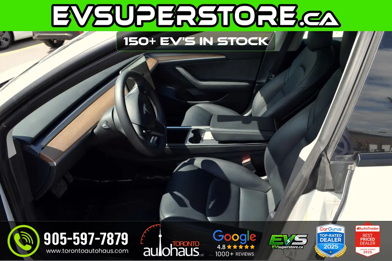 Tesla Model 3 photo Tesla Model 3