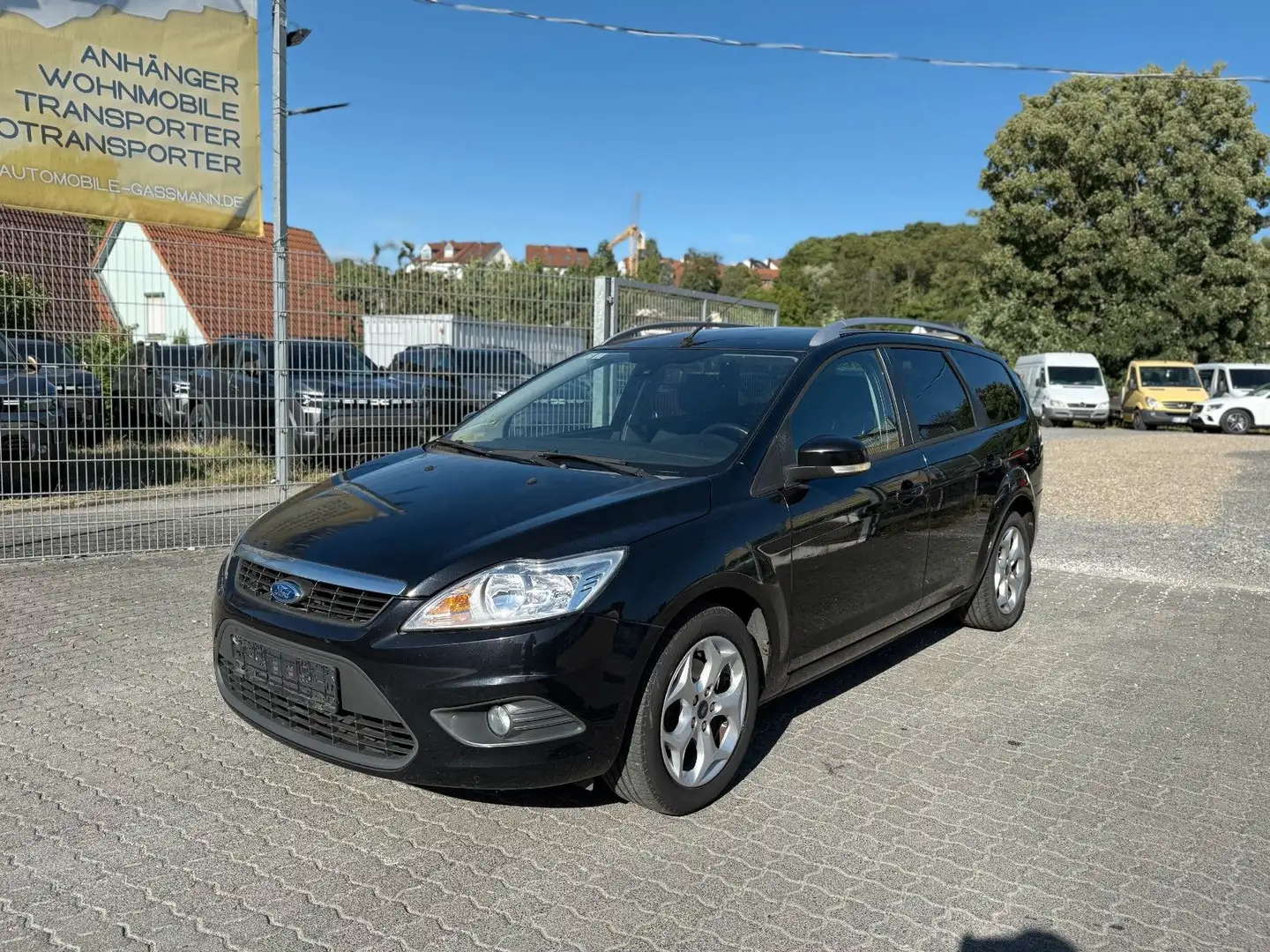 Ford Focus Turnier 1.6i Viva Navi Klima PDC Tüv 05.26 Schwarz - 1