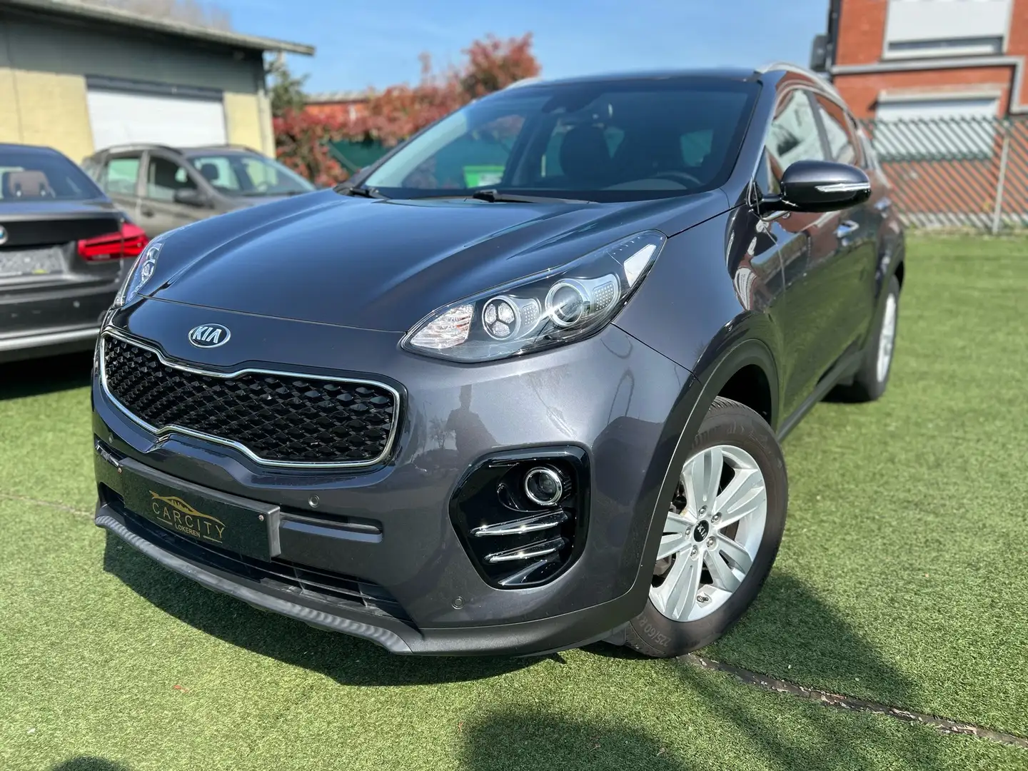 Kia Sportage *89.900KM*2018*1 EIGENAAR*OHB*CAMERA*NAVI*AIRCO Gris - 1
