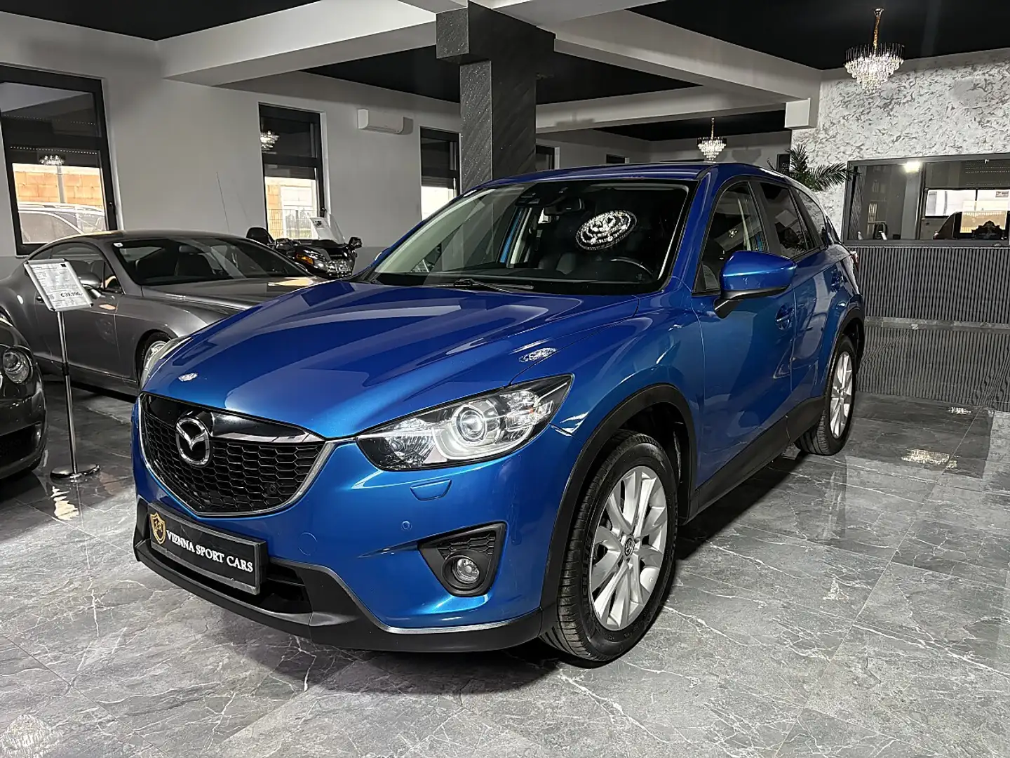 Mazda CX-5 2,0i AWD Revolution Aut.*WENIG-KM*TOP-AUSSTATUNG* Blau - 1