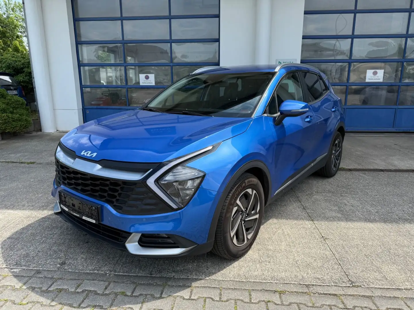 Kia Sportage 1.6 T-GDI Vision Komf DCT 17"el.Sitze Blauw - 1