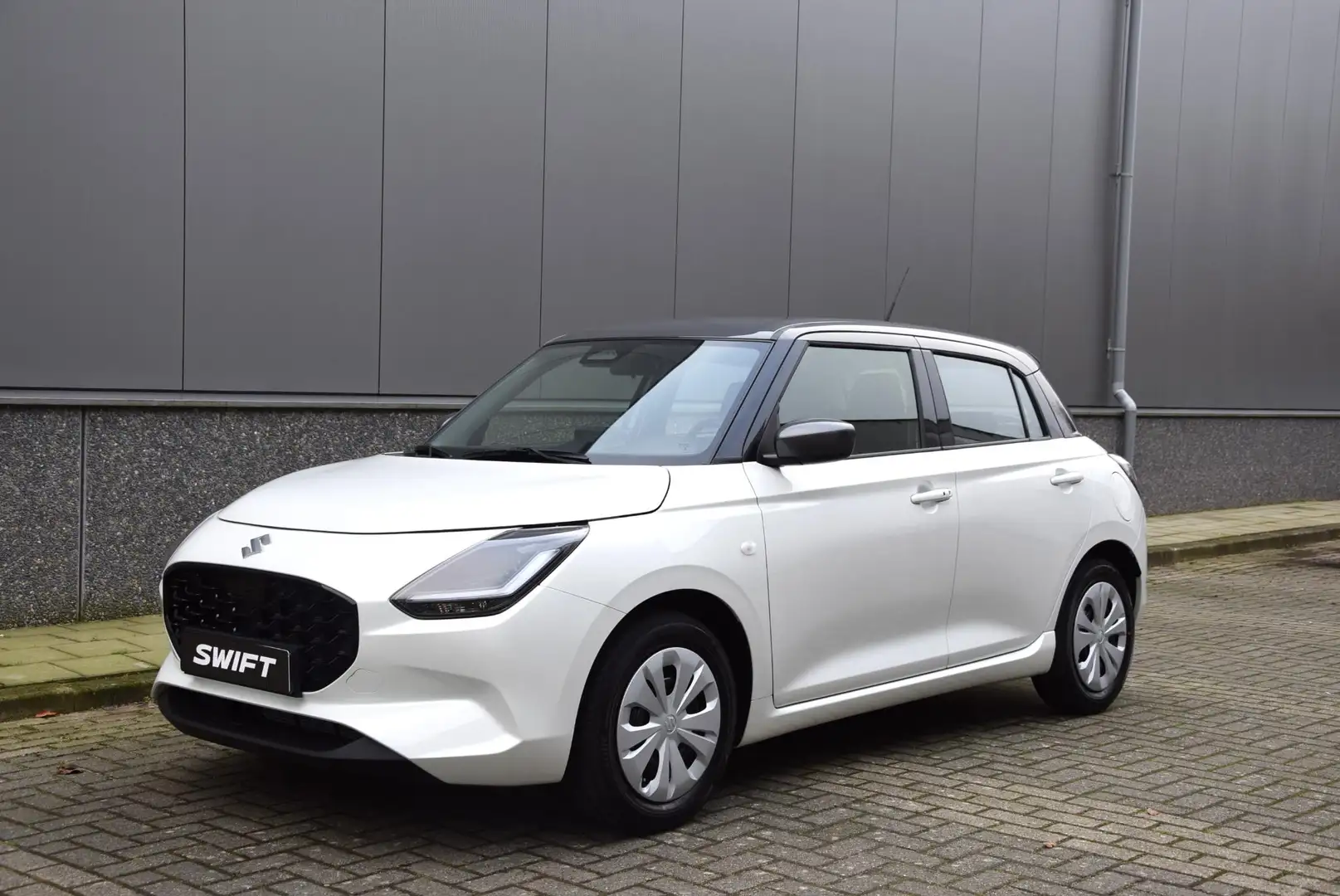 Suzuki Swift 1.2 Comfort Smart Hybrid | 6 jaar garantie of 150. Wit - 2