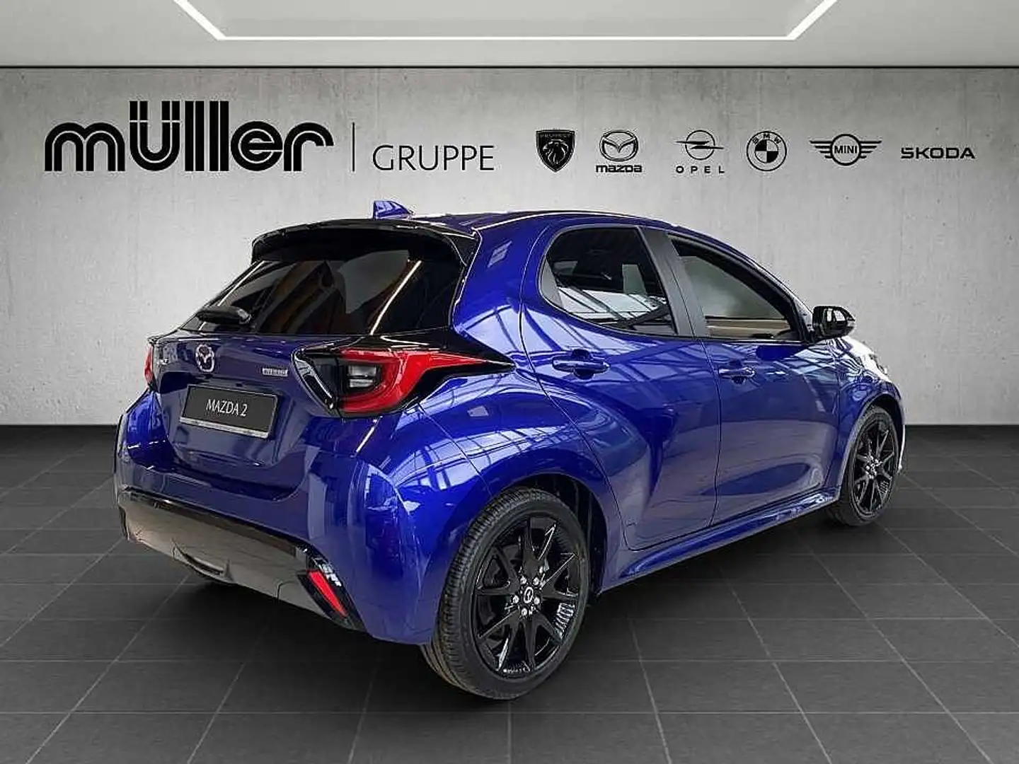 Mazda 2 Hybrid VVT-i 116 PS e-CVT FWD HOMURA PLUS VVT-i 11 Blau - 2