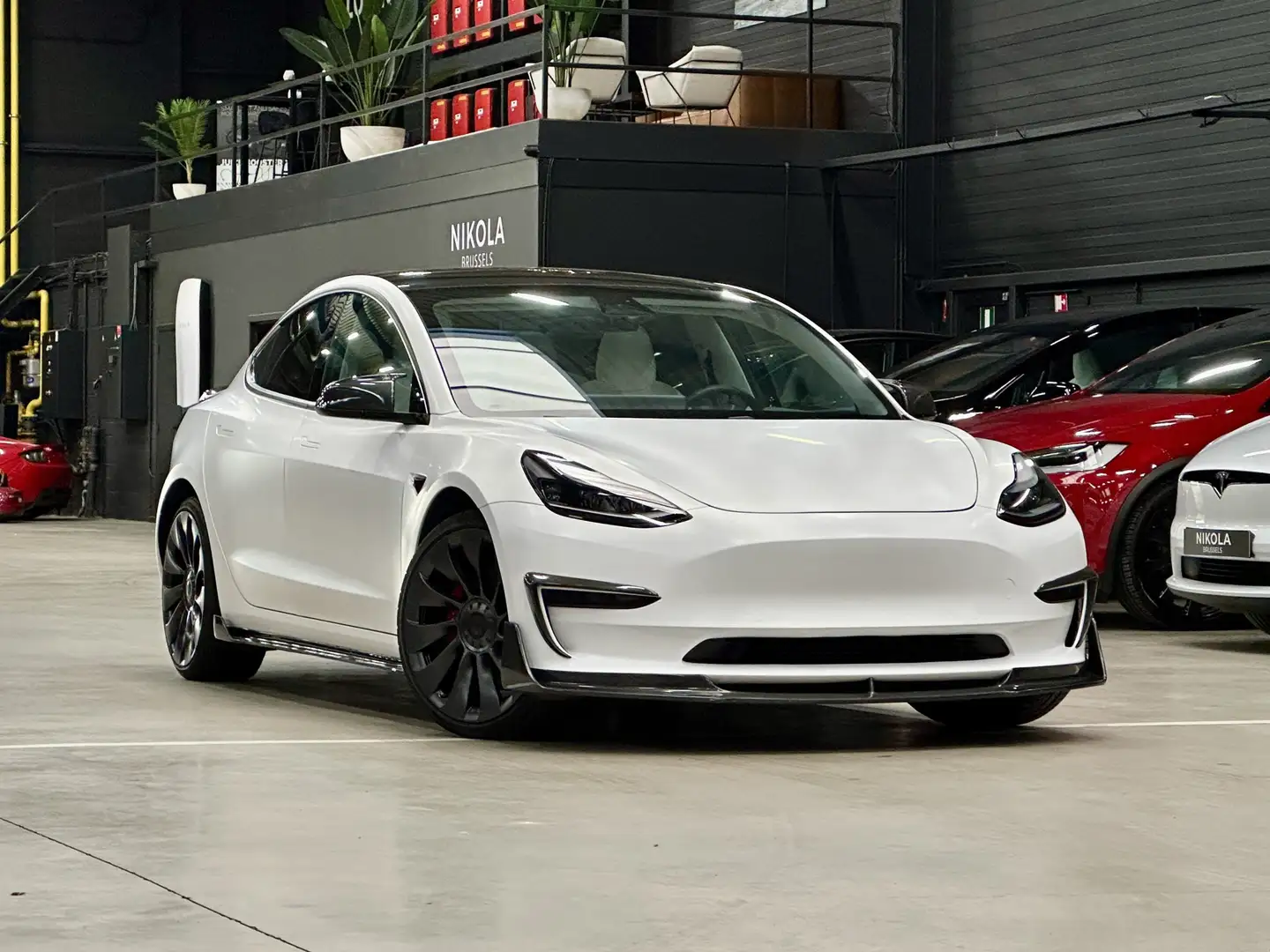 Tesla Model 3 PERFORMANCE - FACELIFT - FULL WRAP - CARBON EXT Weiß - 1