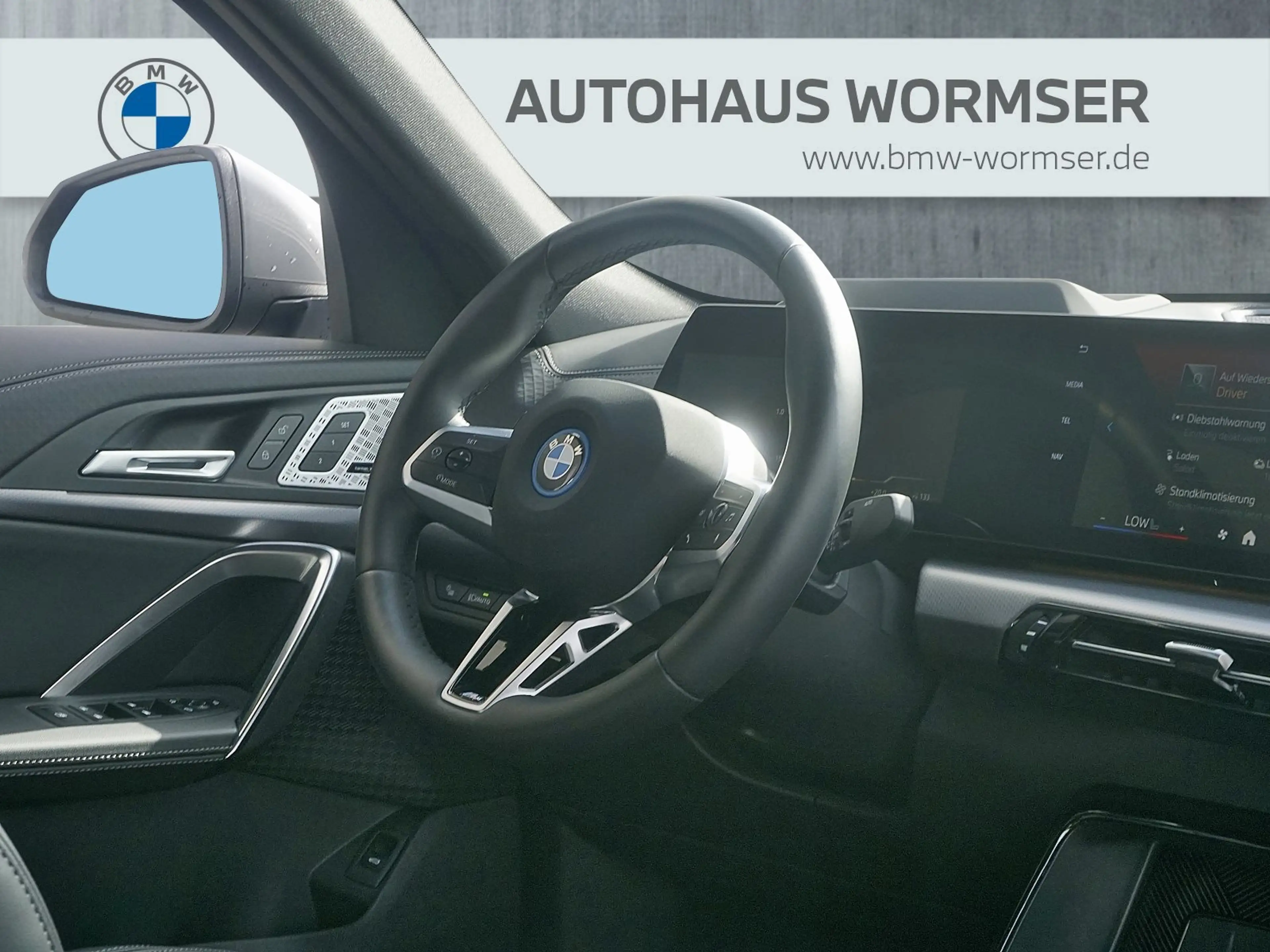 BMW iX2 xDrive30 — photo 11