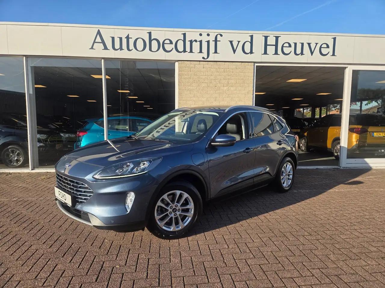 Ford Kuga 2.5 PHEV Titanium X *Camera V+A*Adaptieve Cruise*B — photo 1 of 33