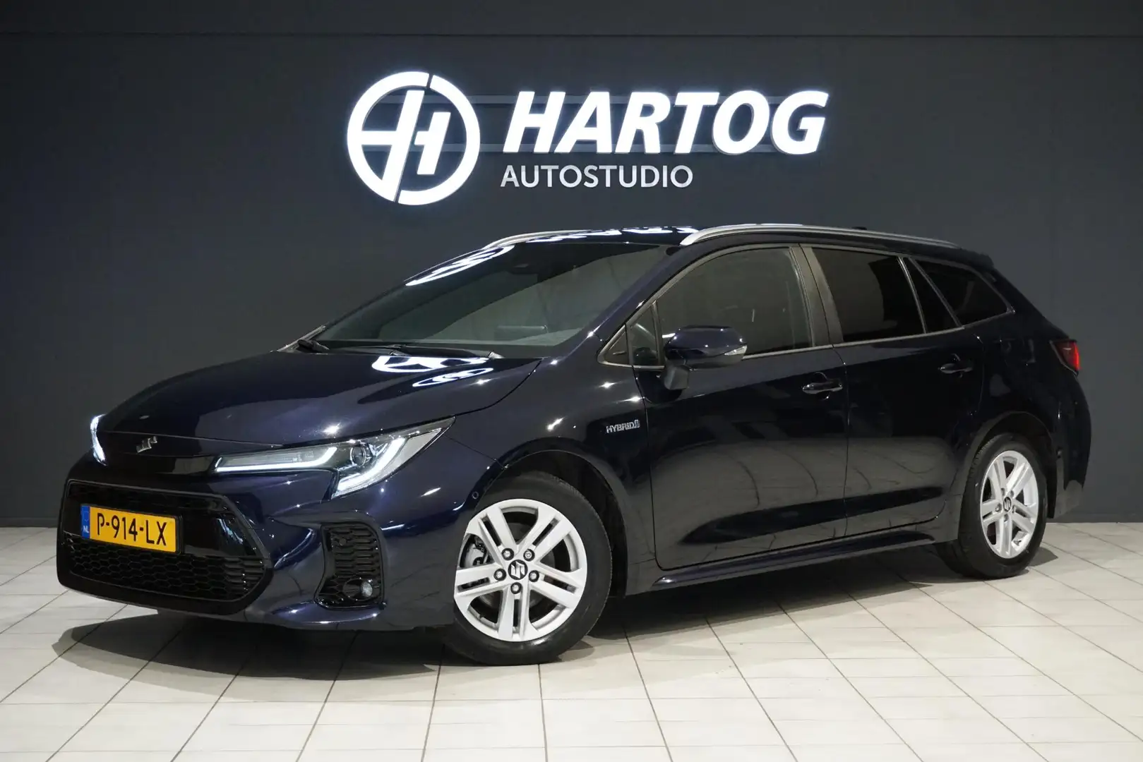 Toyota Corolla 1.8 Hybrid Style + DODEHOEK / STUURVERWARMING / VO Blau - 1