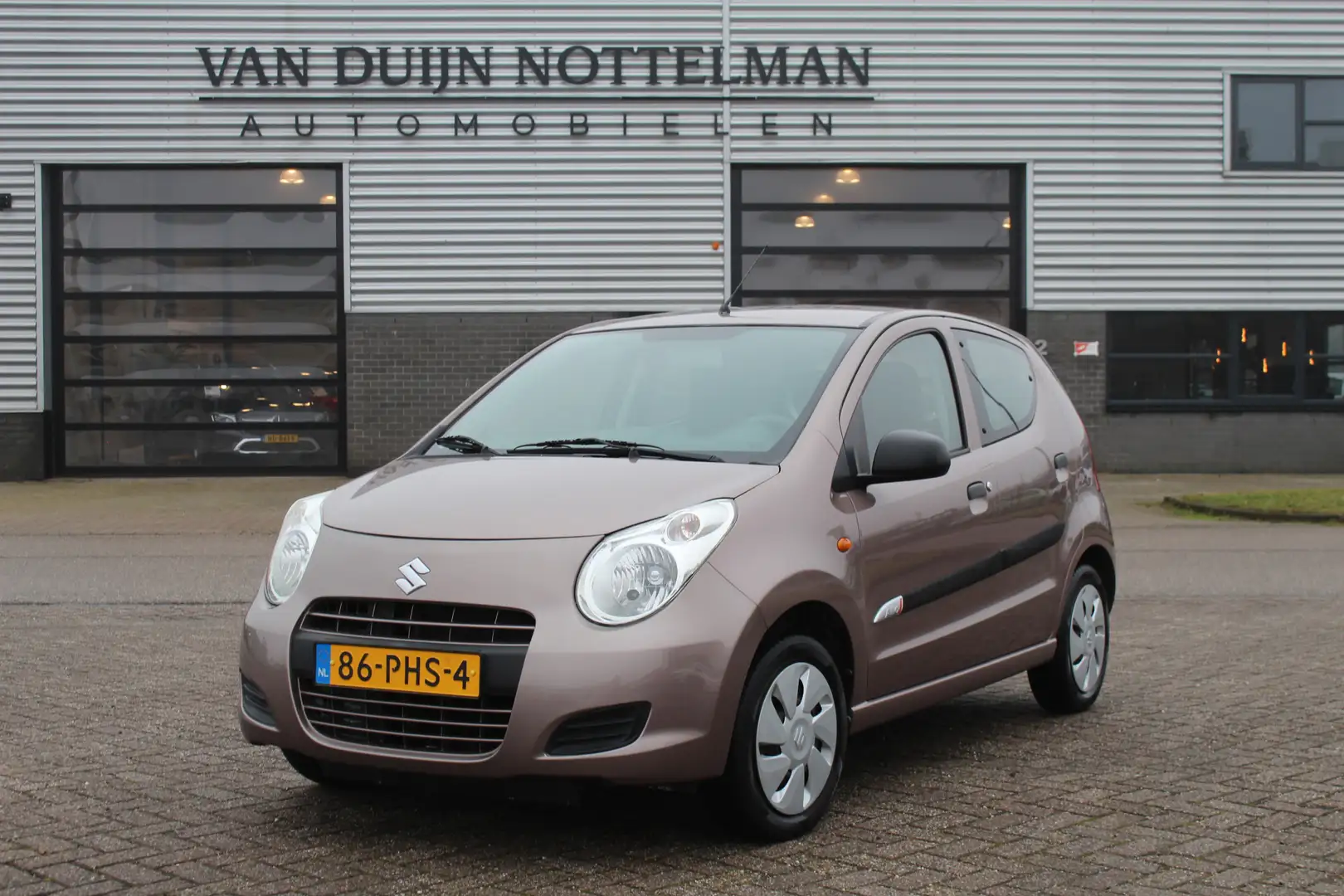 Suzuki Alto 1.0 Comfort Plus / Airco / Zuinig / N.A.P. Braun - 1
