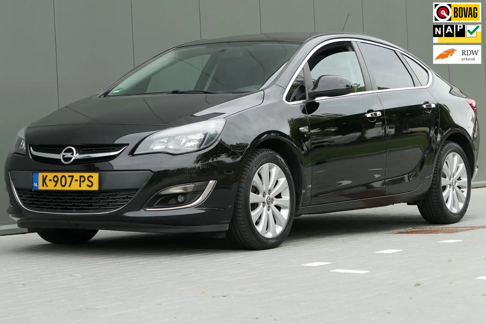 Opel Astra 1.4 Turbo Sedan 140pk Dealer onderhouden Half Lede Noir - 1