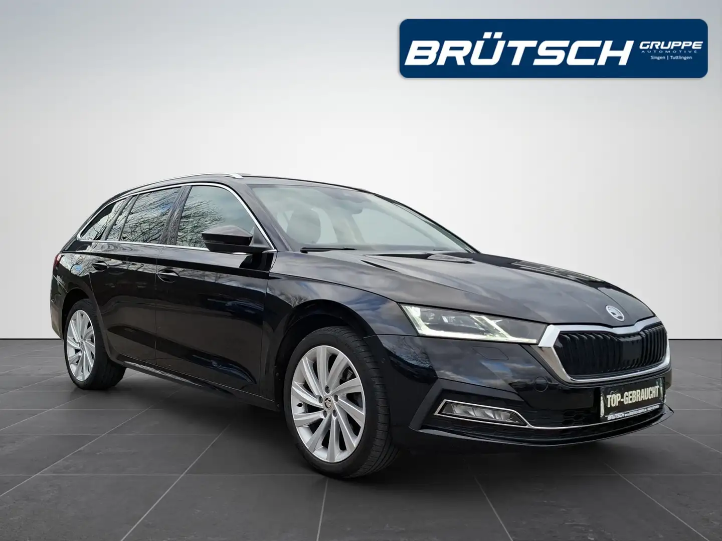 Skoda Octavia Skoda Octavia Combi 1.4 TSI iV First Edition DSG / Schwarz - 2