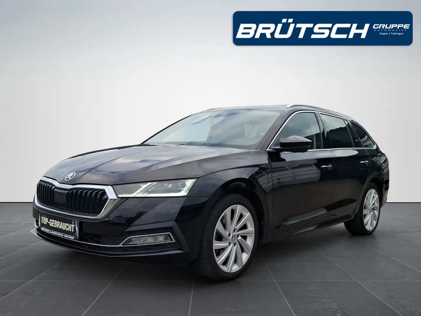 Skoda Octavia Skoda Octavia Combi 1.4 TSI iV First Edition DSG / Schwarz - 1
