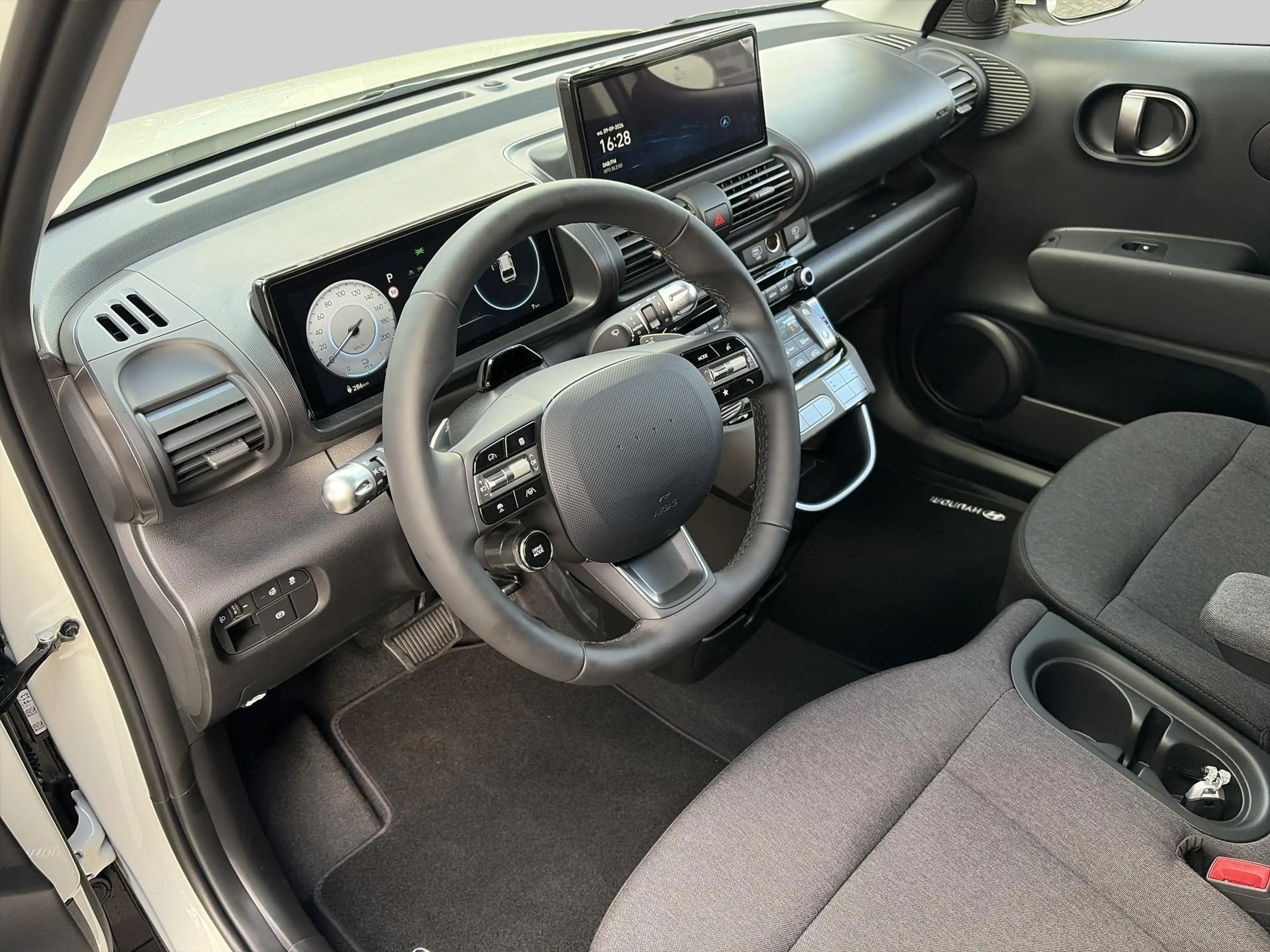 Hyundai Inster Pulse Advanced 42 kWh | Achteruitrijcamera | Airco — photo 4