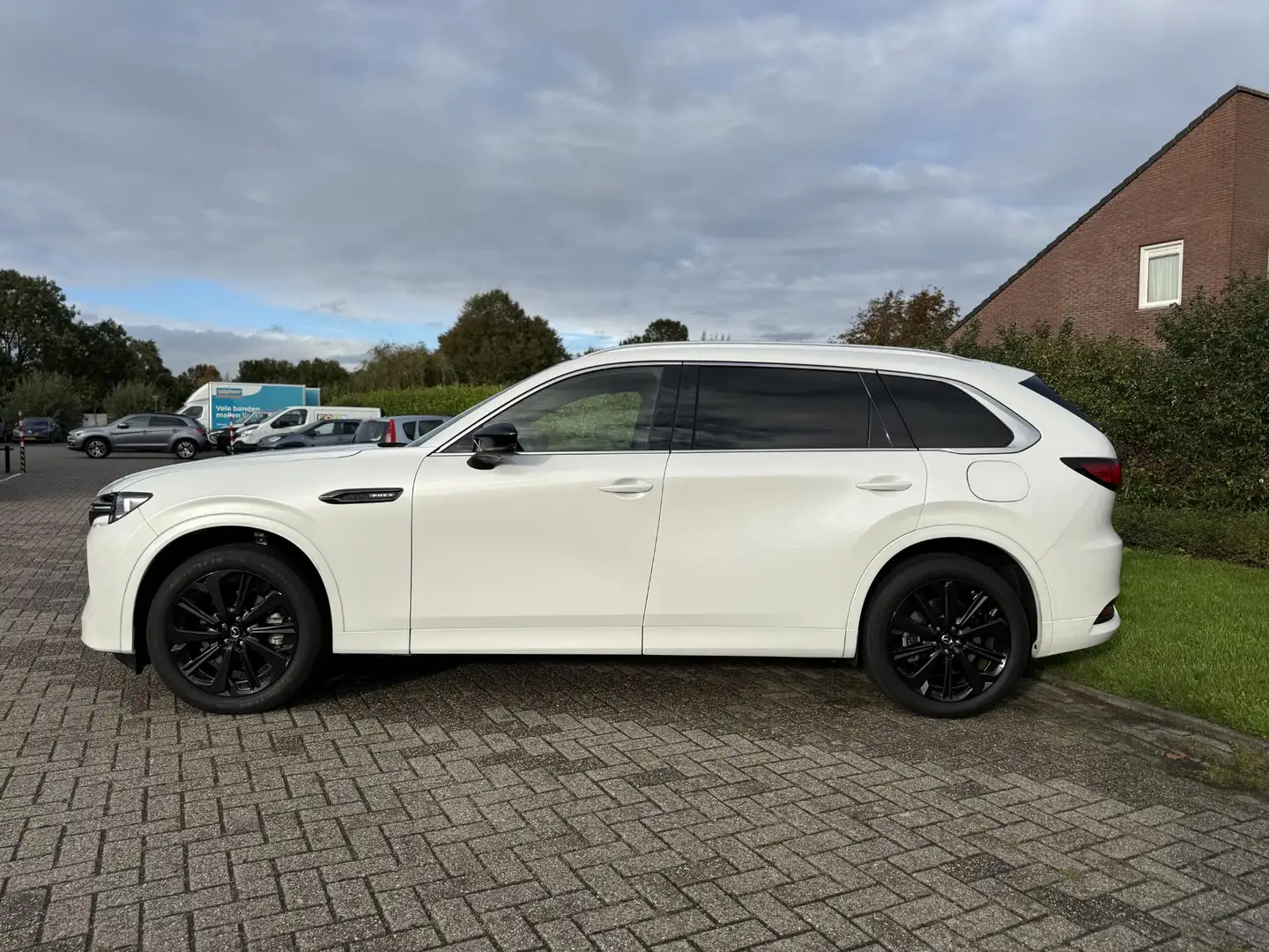 Mazda CX-80 2.5 e-SkyActiv PHEV Homura Plus Pano | 7 persoons Weiß - 2