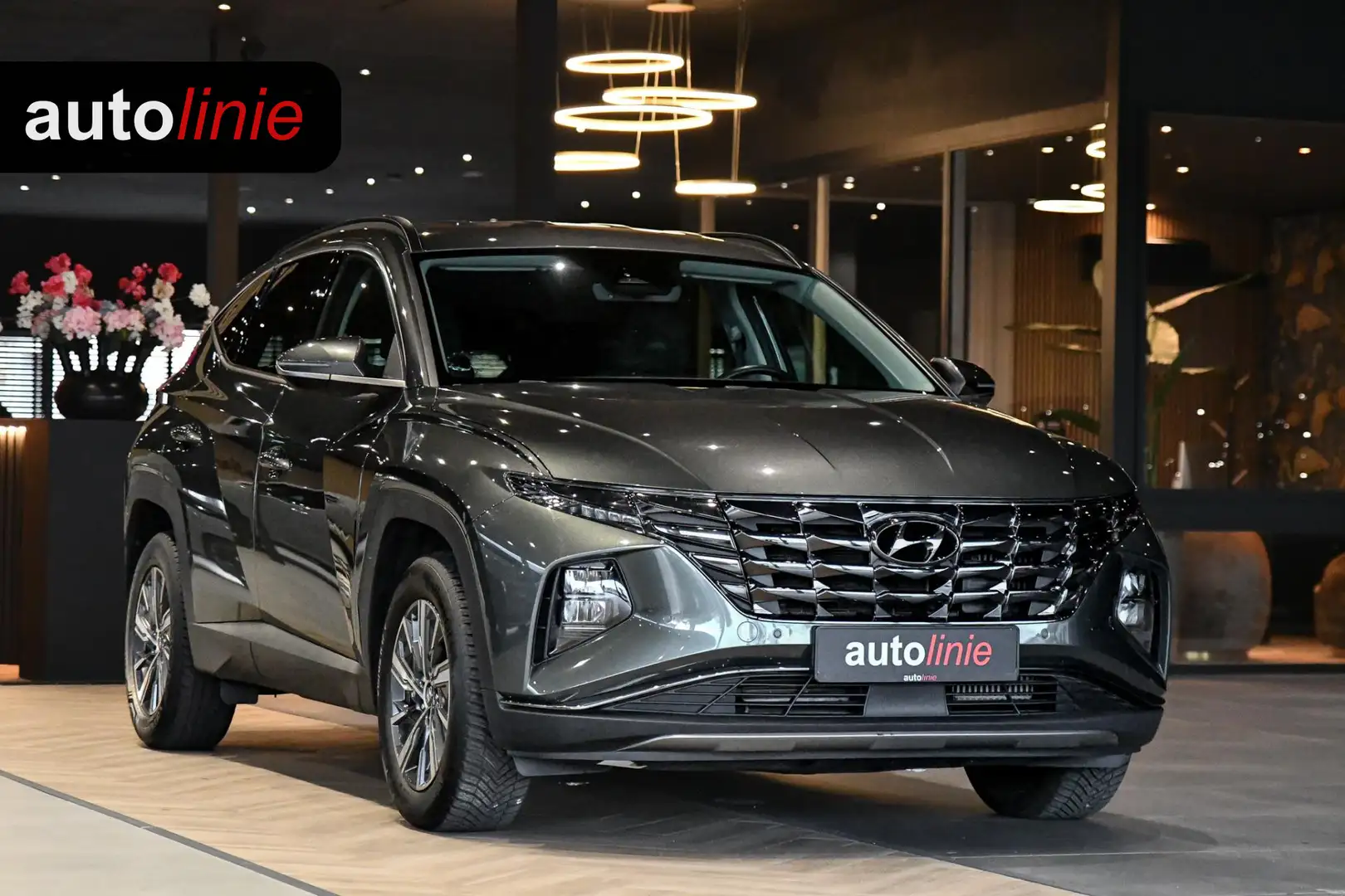 Hyundai TUCSON 1.6 T-GDI HEV Comfort. ACC, Camera, Trekhaak, Keyl Gris - 1