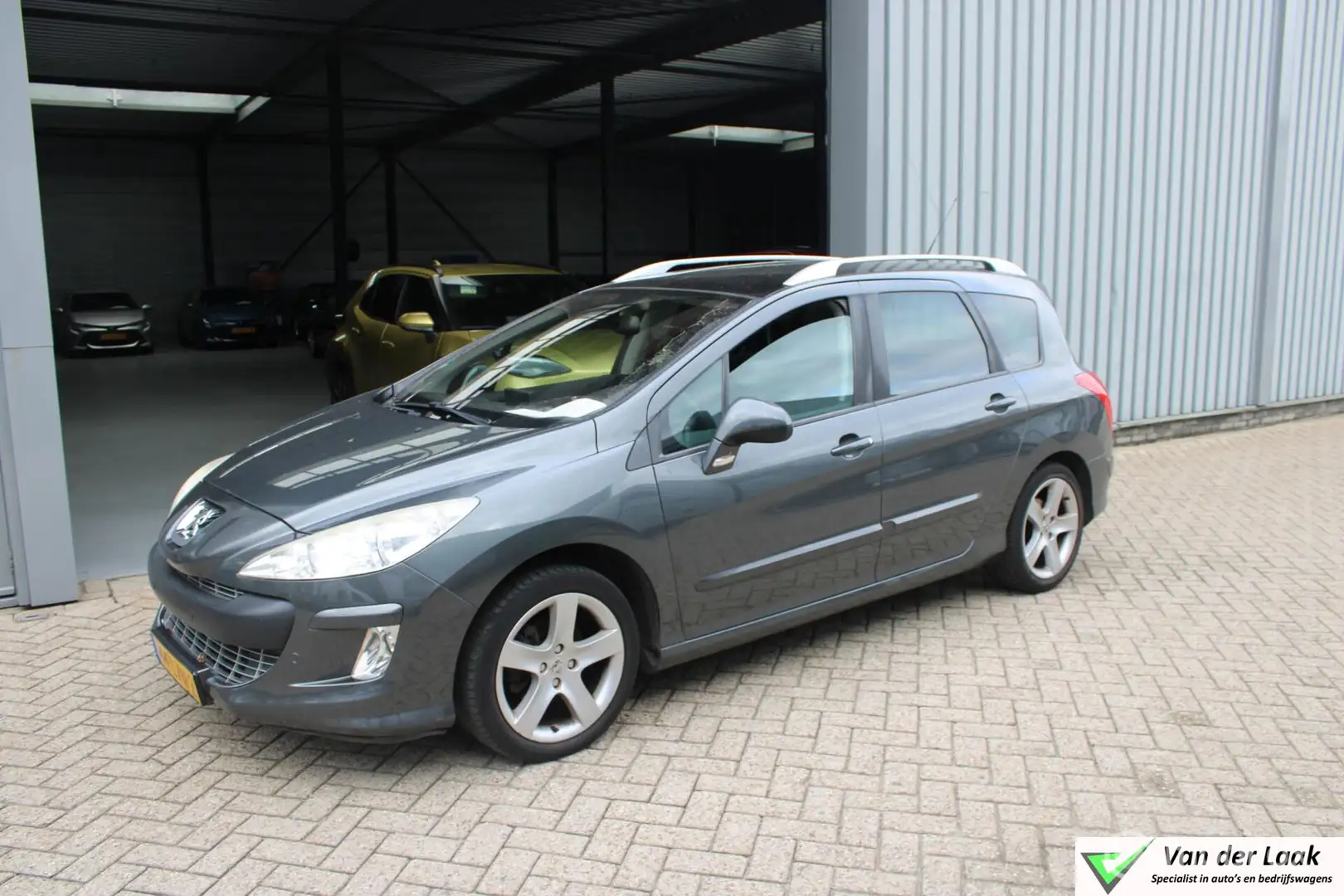 Peugeot 308 SW 1.6 e-HDi Signature Export prijs Grijs - 1