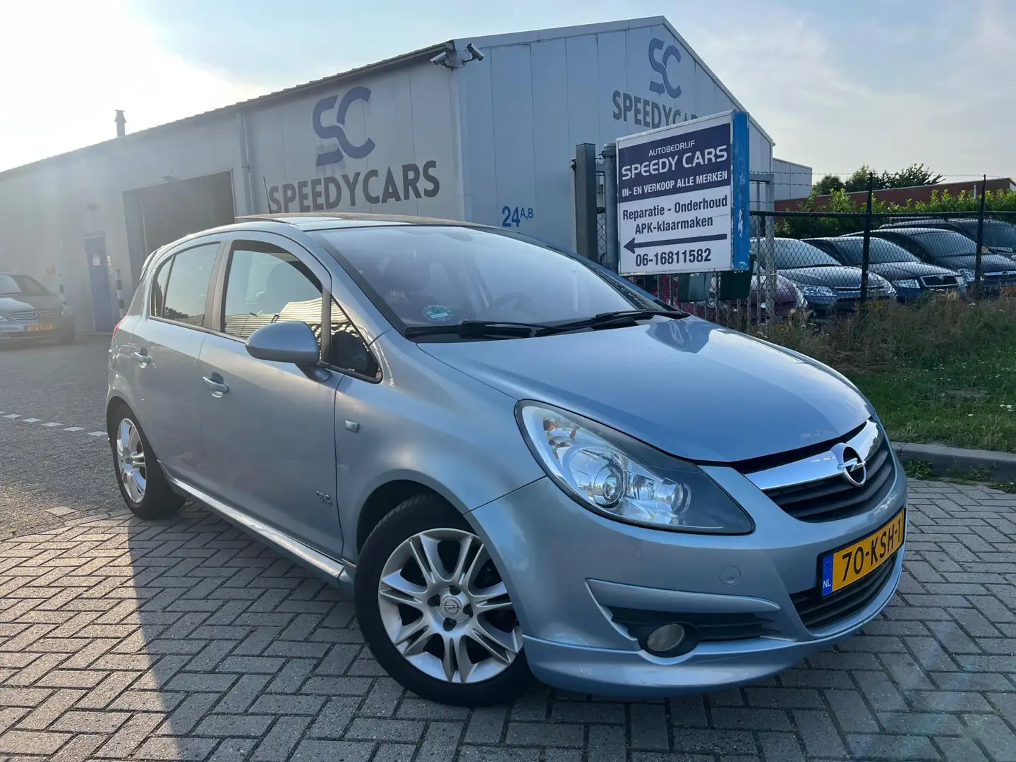 Opel Corsa 1.4-16V Cosmo 2010 Pano Half Leer Airco Cruise Blauw - 1
