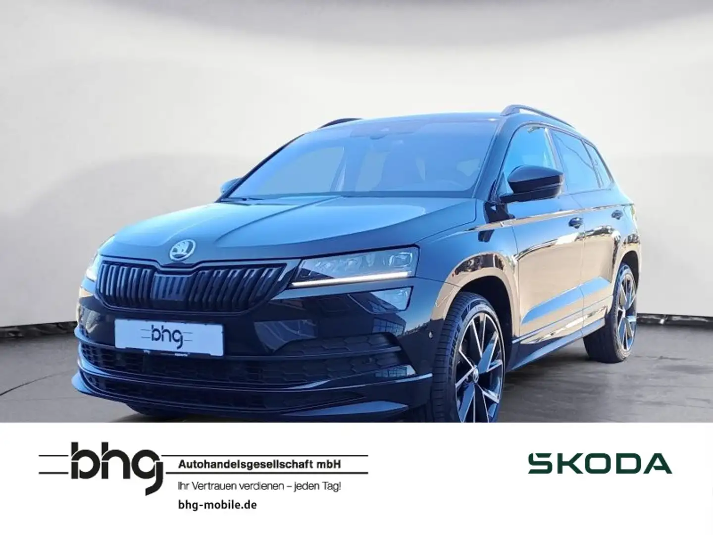 Skoda Karoq 2.0 TSI DSG 4x4 Sportline Navi Pano ACC Zwart - 1