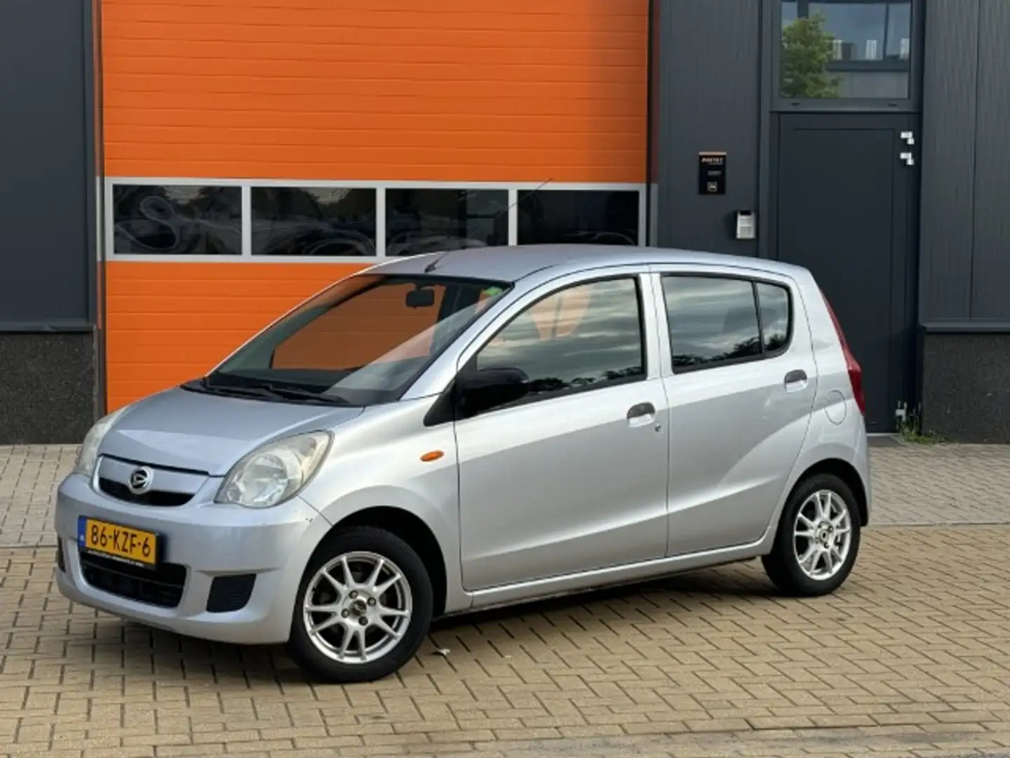 Daihatsu Cuore 1.0 Comfort Airco Grijs - 1