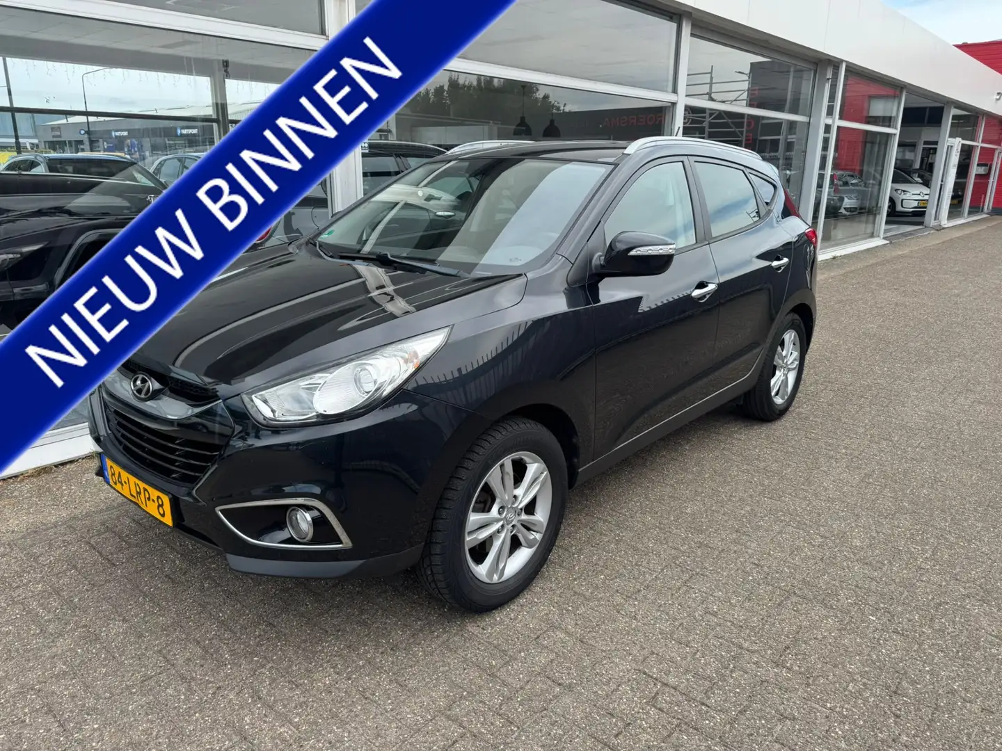 Hyundai iX35 SUV | 2.0i Style | 1e eigenaar | Airco | Navigatie Zwart - 1