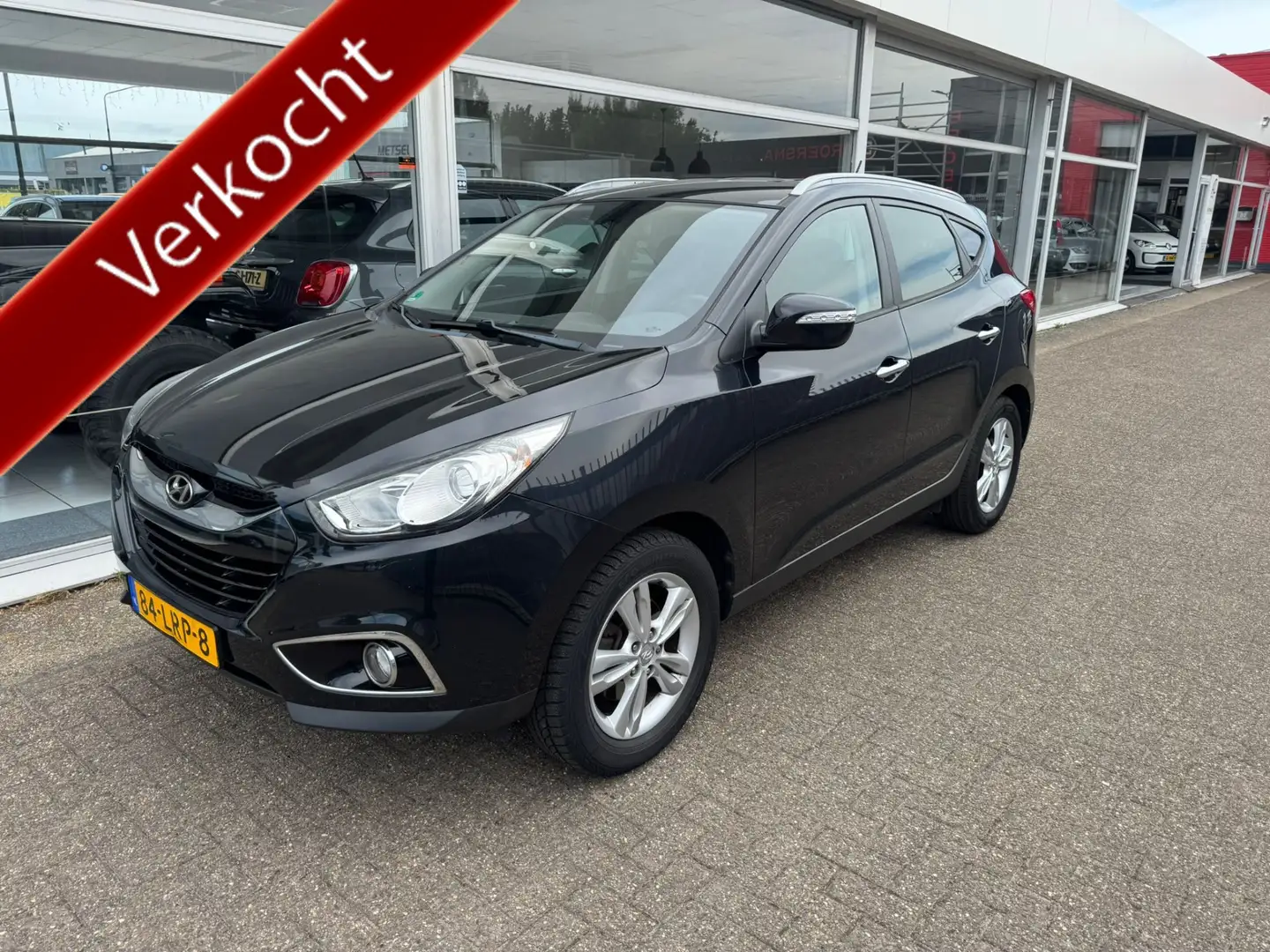 Hyundai iX35 SUV | 2.0i Style | 1e eigenaar | Airco | Navigatie Nero - 1