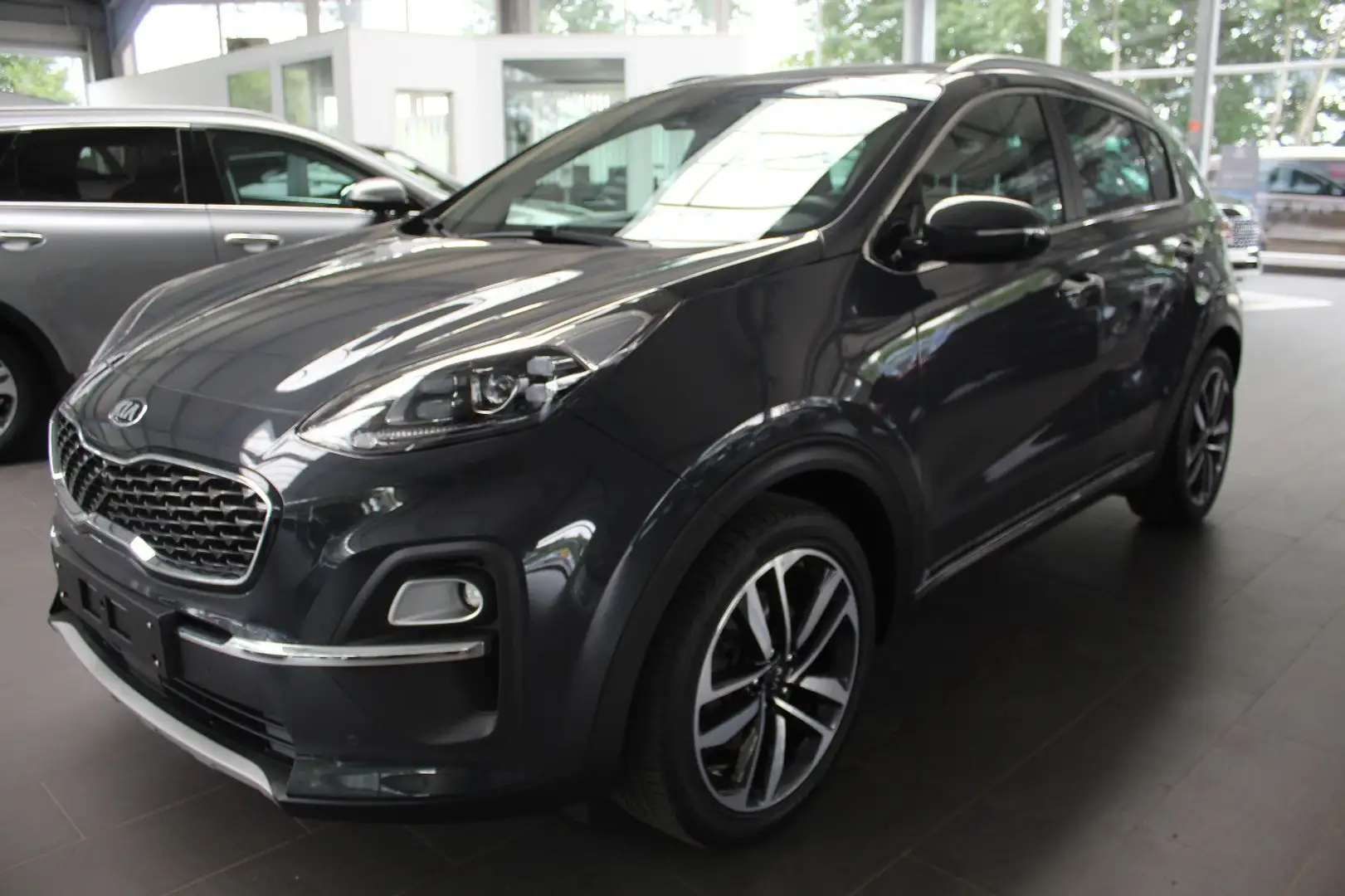 Kia Sportage 1.6 T-GDI Spirit Autom. (Technologie) Grau - 1