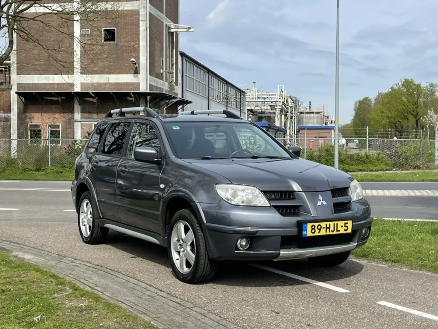 Mitsubishi Outlander 2.4 Scott 4WD | AUTOMAAT | LPG G3 | APK 1-2026 Grau - 1