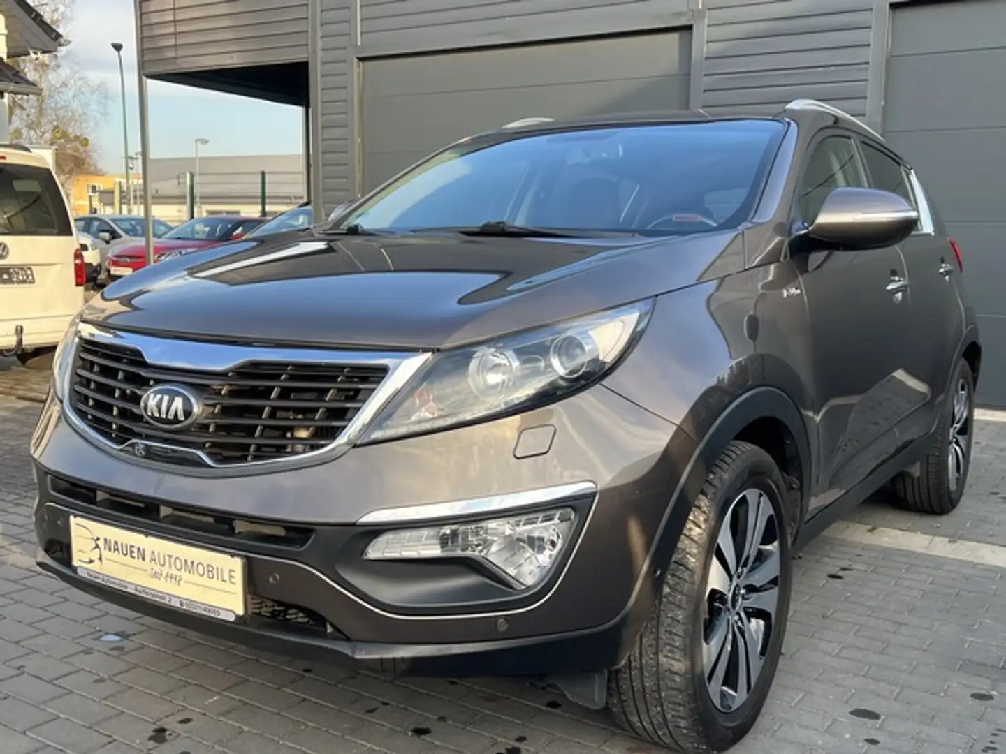 Kia Sportage Spirit+Klima+SHZ+RFK+Navi+Automatik+ Braun - 1