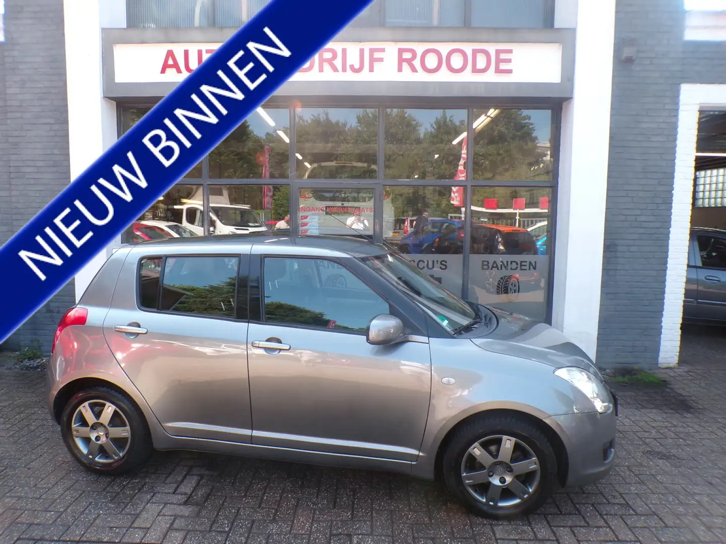 Suzuki Swift 1.3 5-Drs Comfort AIRCO, LMV! Grau - 1