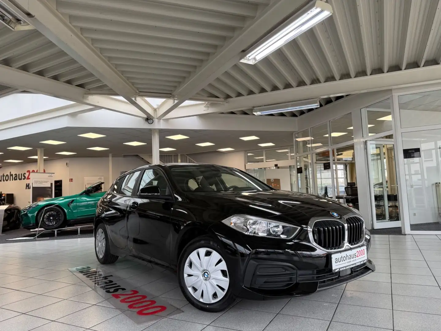 BMW 116 d AUT./NAVI/PDC V-H/DAB/WLAN/SHZ Noir - 1