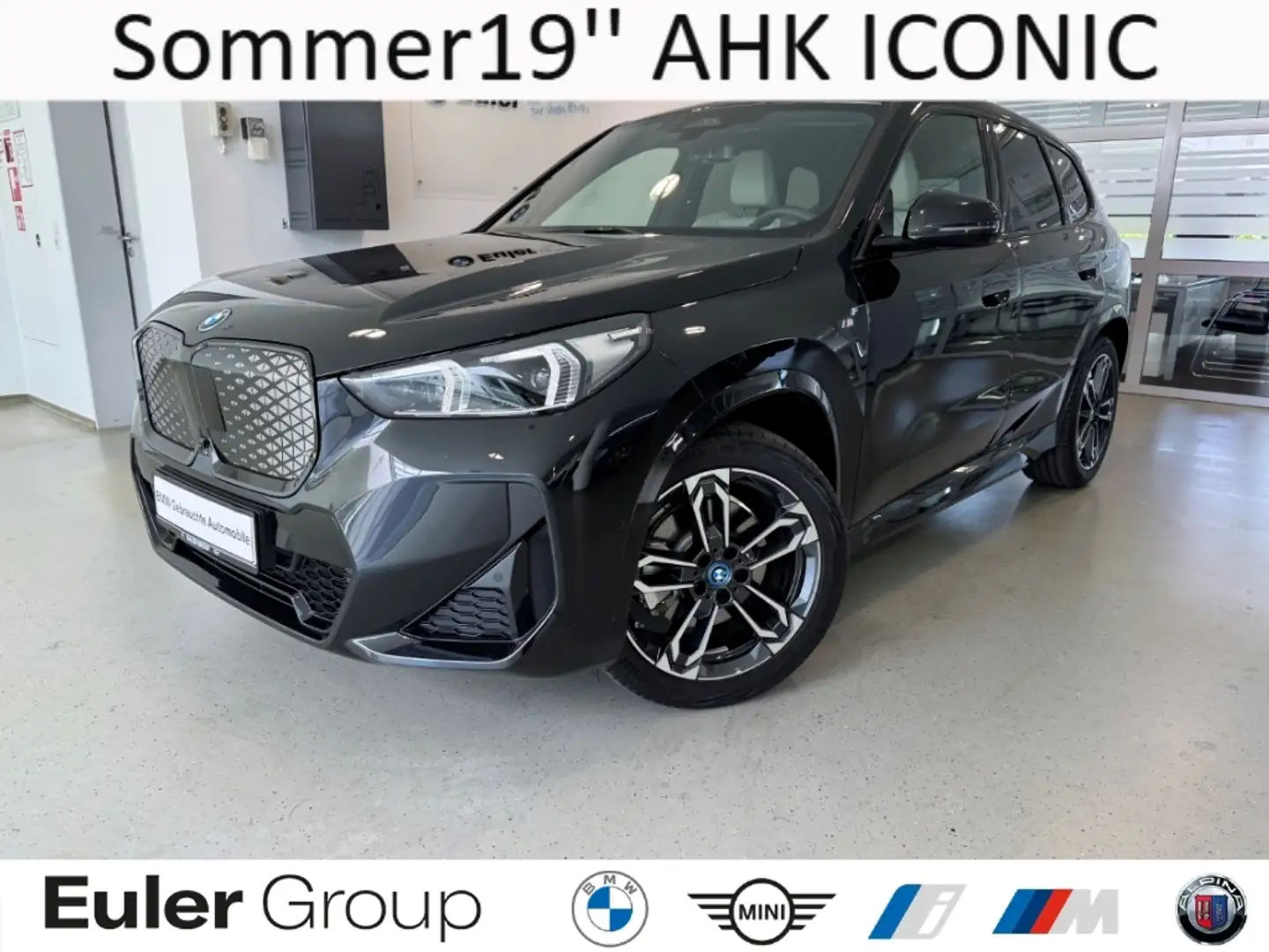 BMW iX1 30 M-Sport Sommer19'' ParkAss+ AHK ICONIC Ad-M-Fah Negro - 1