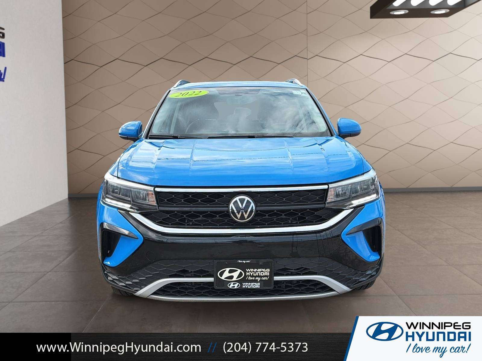 used 2022 Volkswagen Taos car, priced at $24,000
