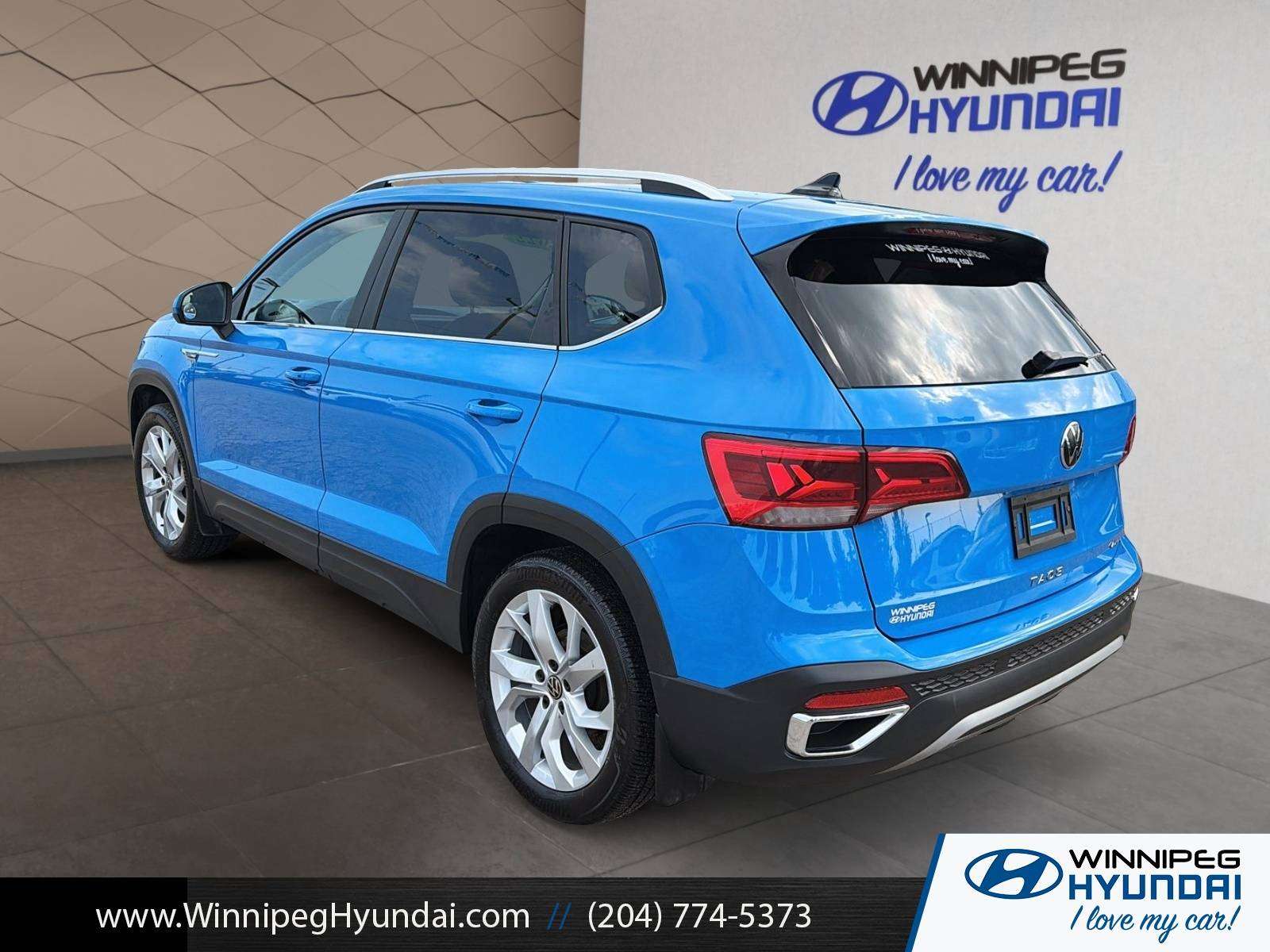 used 2022 Volkswagen Taos car, priced at $24,000