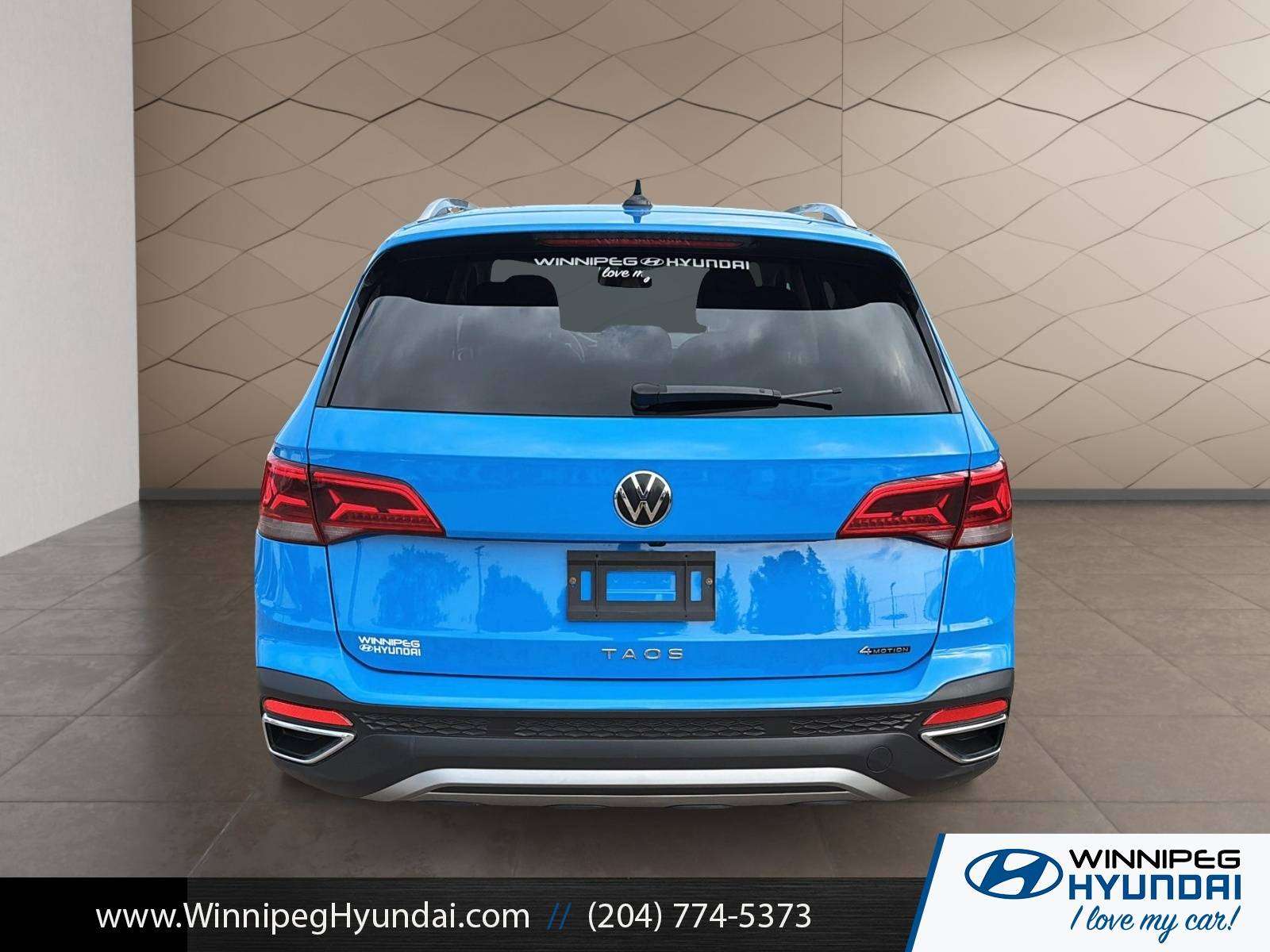 used 2022 Volkswagen Taos car, priced at $24,000